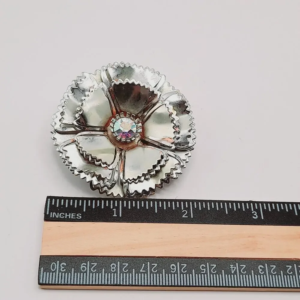 Vintage Silver Tone Flower Brooch with AB Rhinestone Center Reflective Floral